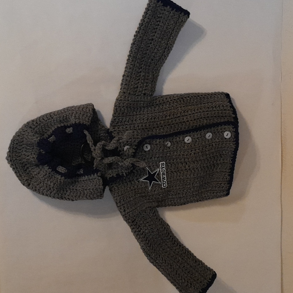 A cowboys baby hoodie.
